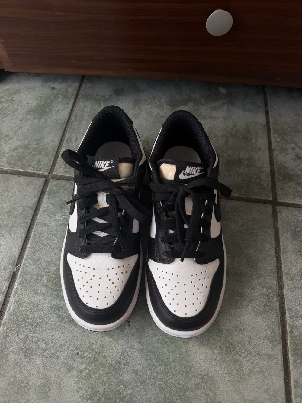 Nike Kids Black and White Low-Top Sneakers with Classic Swoosh